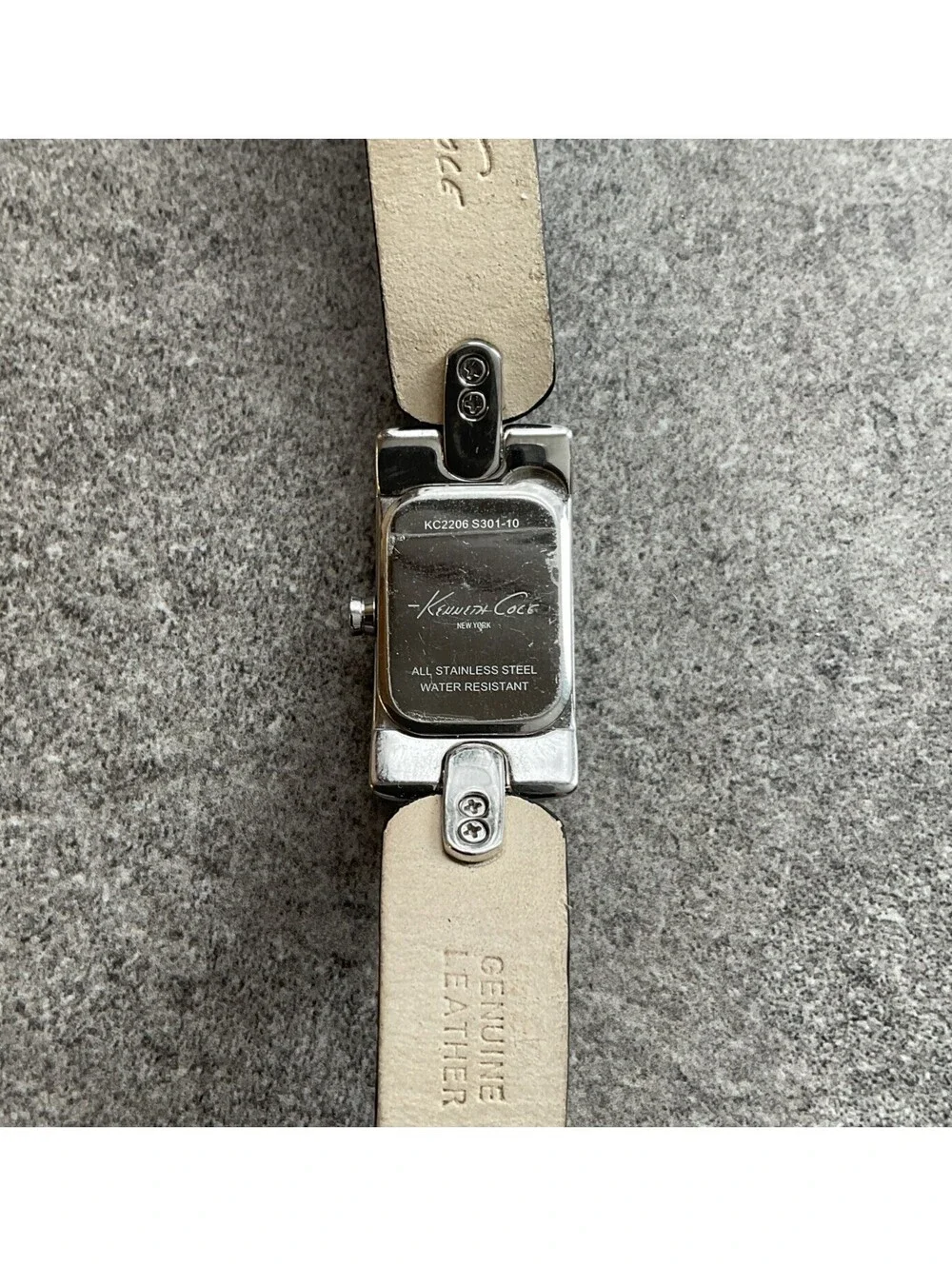 Kenneth Cole Womens Tank Style Watch 17mm Silver Tone Case Black Leather Band D2